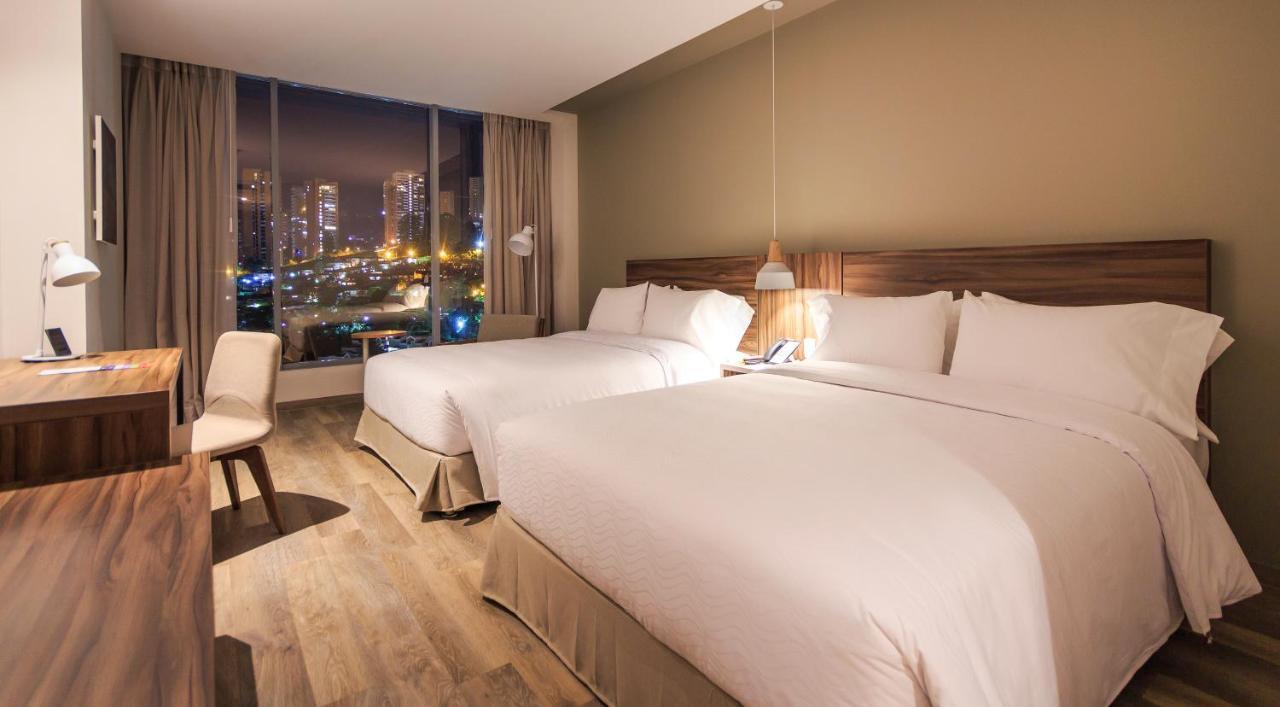 Novotel Medellin El Tesoro Dış mekan fotoğraf A room at the hotel
