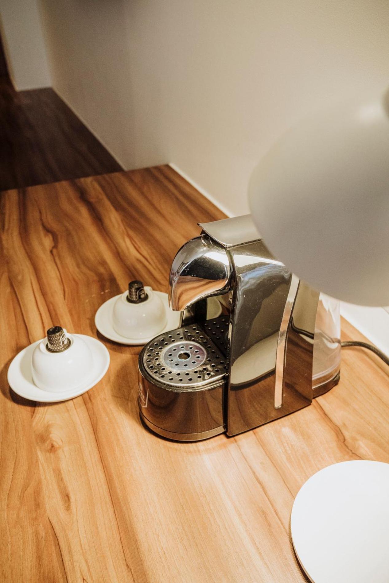 Novotel Medellin El Tesoro Dış mekan fotoğraf A Nespresso coffee machine