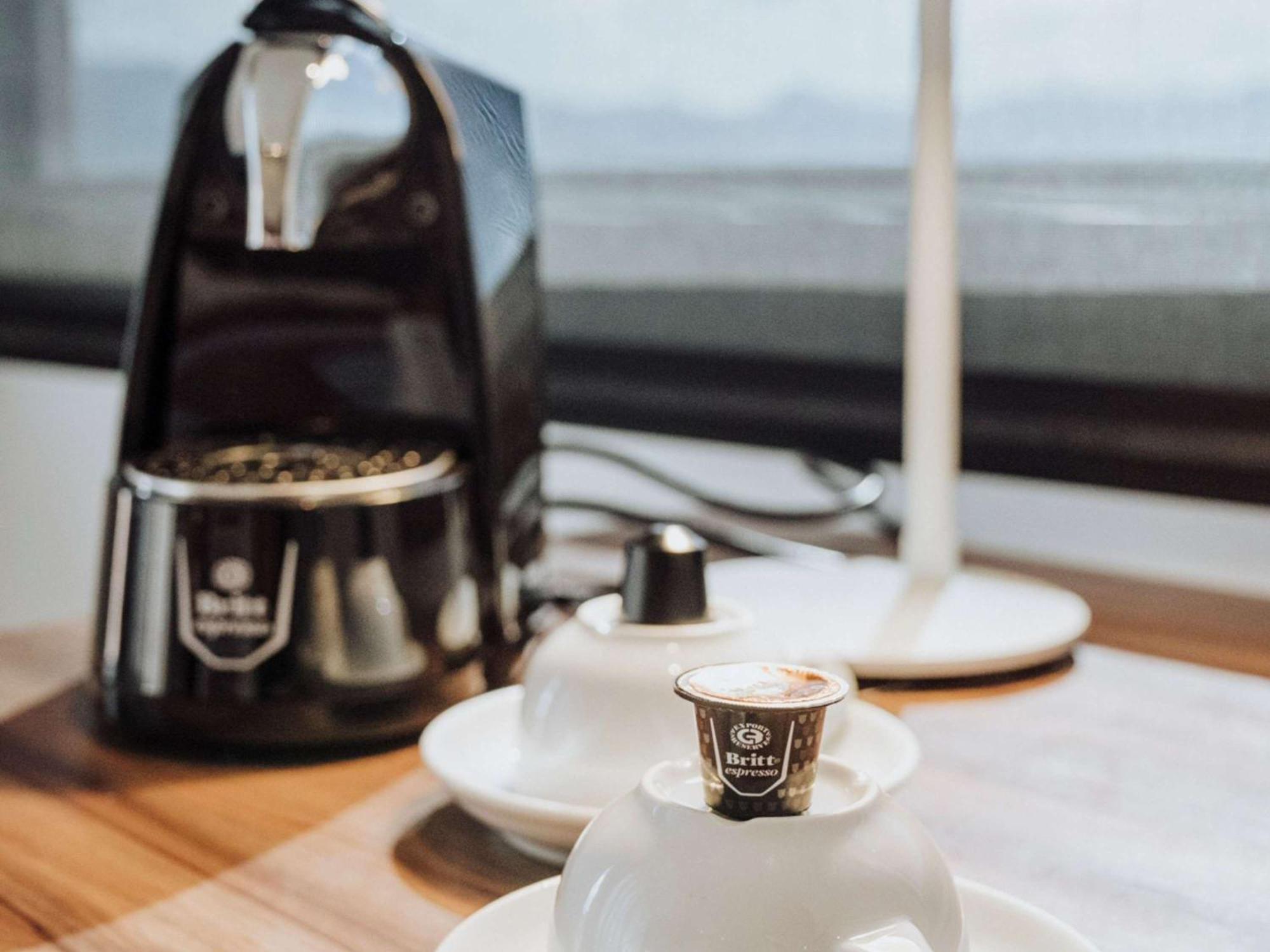 Novotel Medellin El Tesoro Dış mekan fotoğraf A coffee machine
