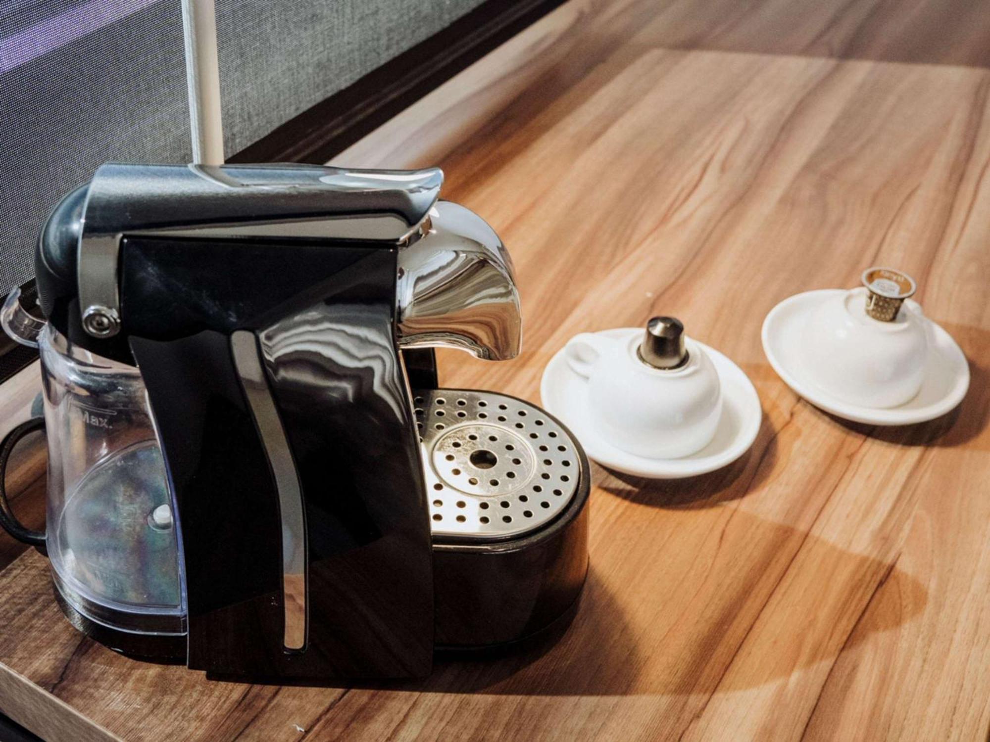 Novotel Medellin El Tesoro Dış mekan fotoğraf A Nespresso coffee machine
